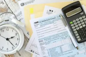Time to file taxes, income tax forms, IRS deadline, paperwork, April 15th, owe, refund, payment